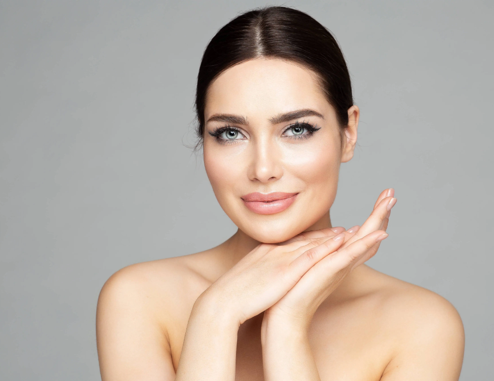 Woman showing smooth skin after Jeuveau® wrinkle-reducing injections at Coastal Glo Med Spa | Medical Aesthetics | Corpus Christi, TX