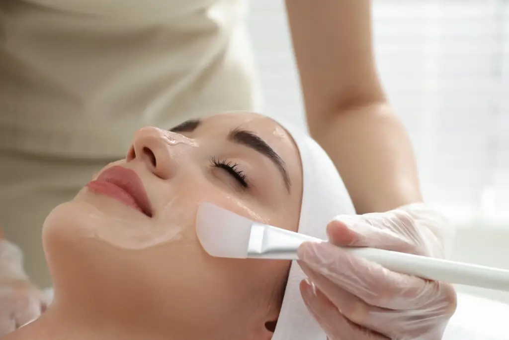 Woman receiving chemical peel treatment at Coastal Glo Med Spa in Corpus Christi, TX
