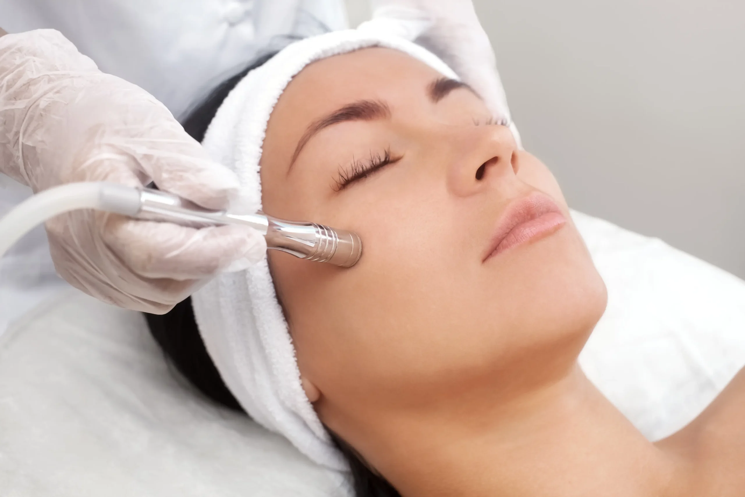 A woman receiving ADVATx™ laser treatment at Coastal Glo Med Spa | Medical Aesthetics | Corpus Christi, TX