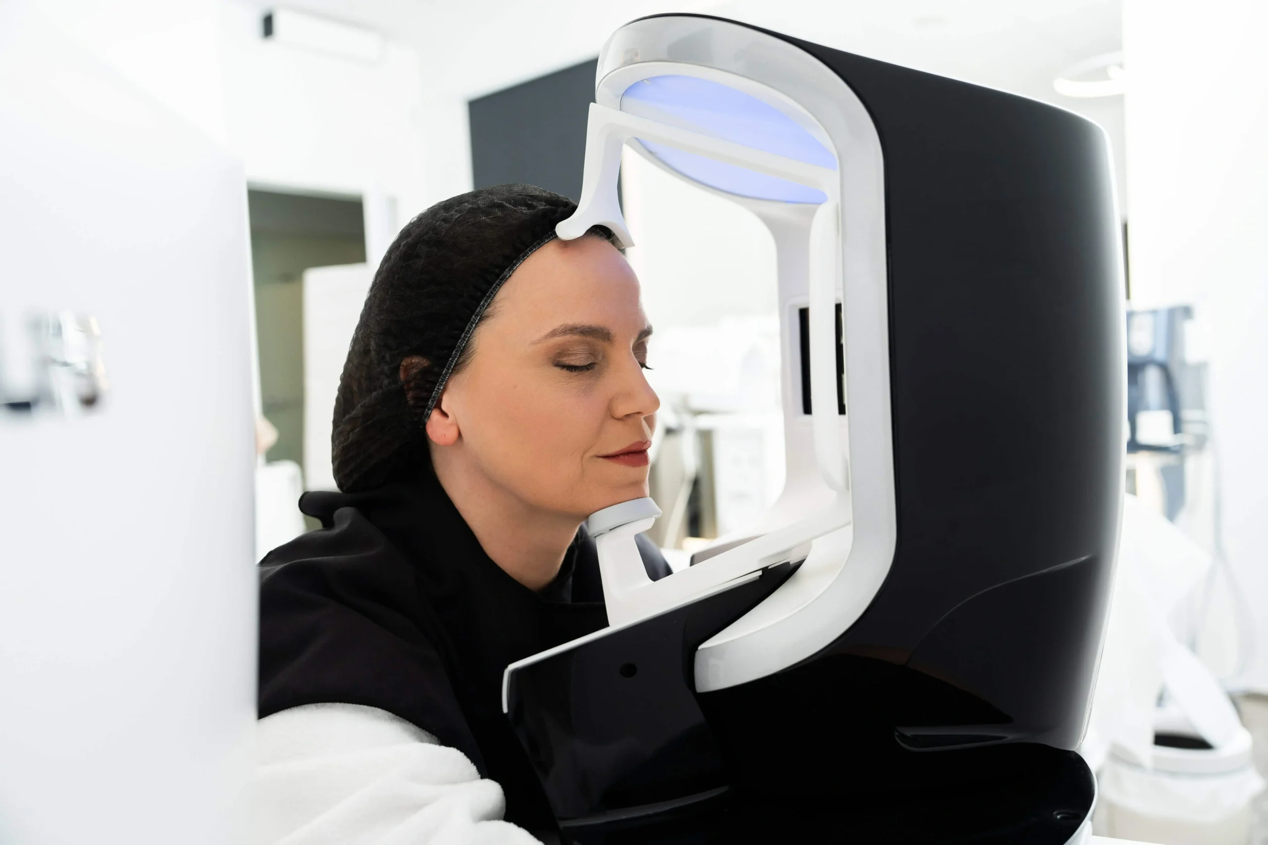 A woman receiving VISIA® Skin Analysis at Coastal Glo Med Spa | Medical Aesthetics | Corpus Christi, TX