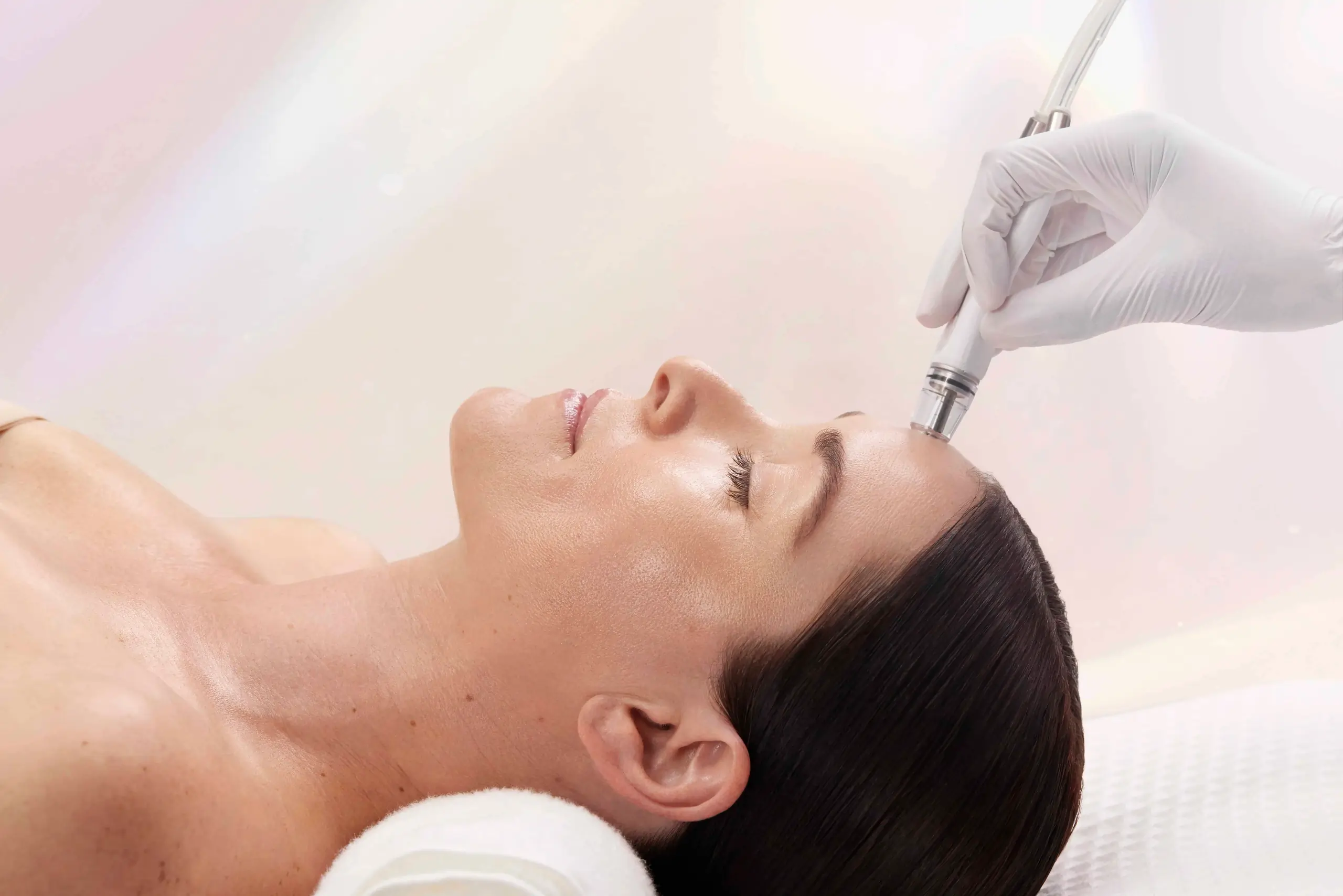 A woman receiving Microdermabrasion with DiamondGlow® at Coastal Glo Med Spa | Medical Aesthetics | Corpus Christi, TX